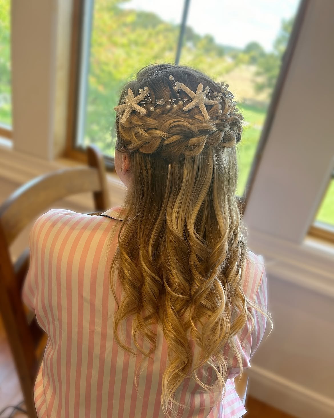Braided Updo With Starfish Hair Accessories