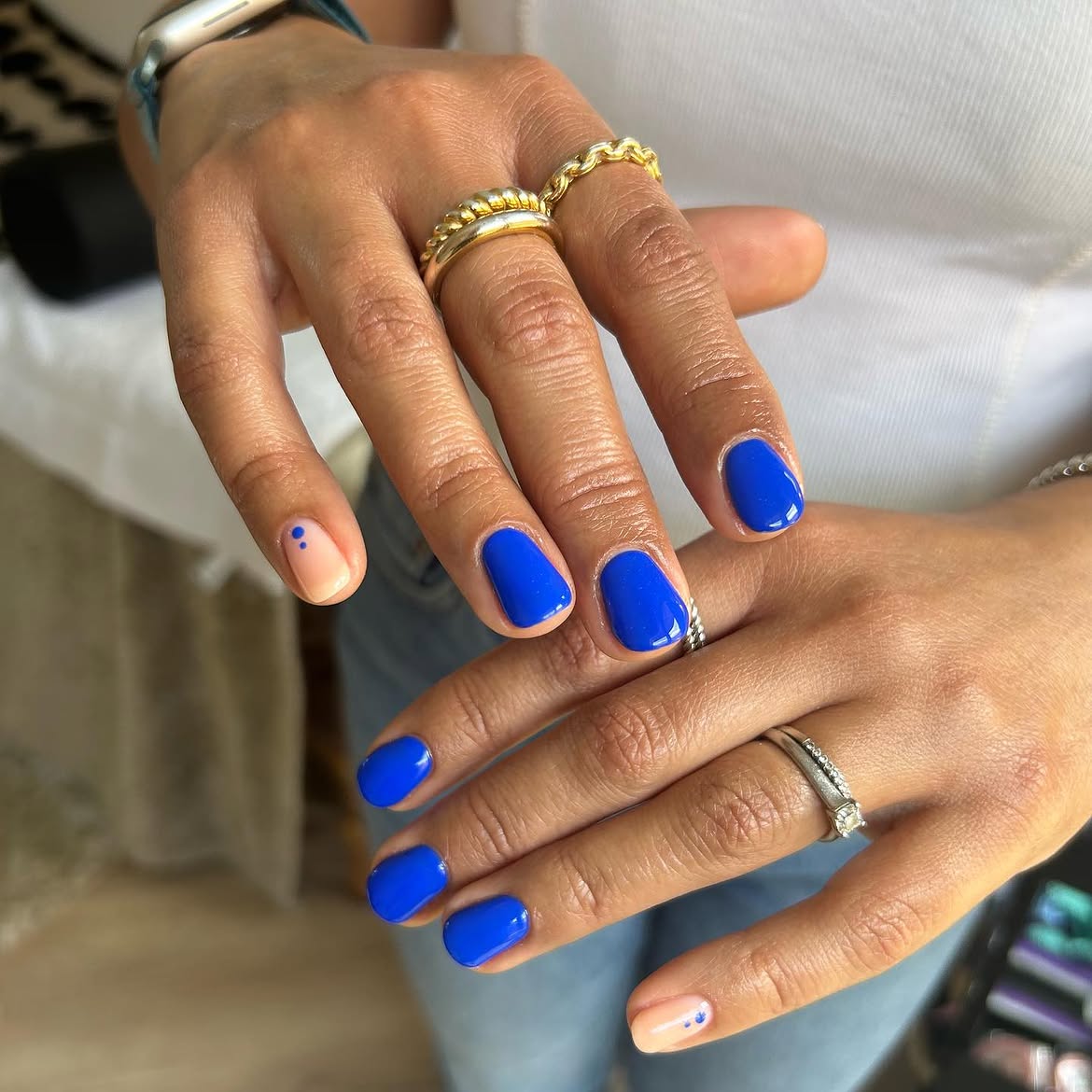Bright Blue Glossy Nails with Nude Accent