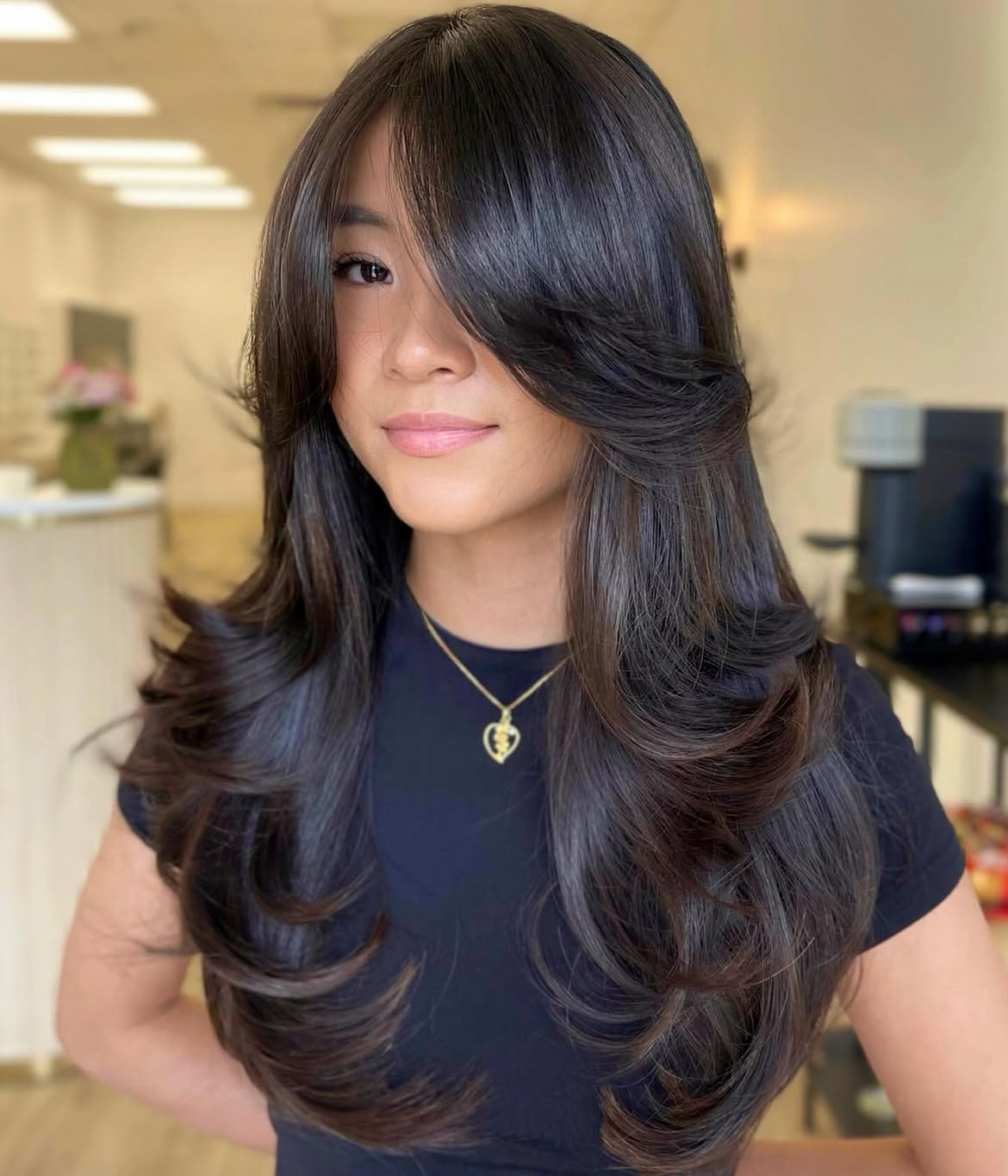 Brunette Butterfly Cut With Face Framing Layers