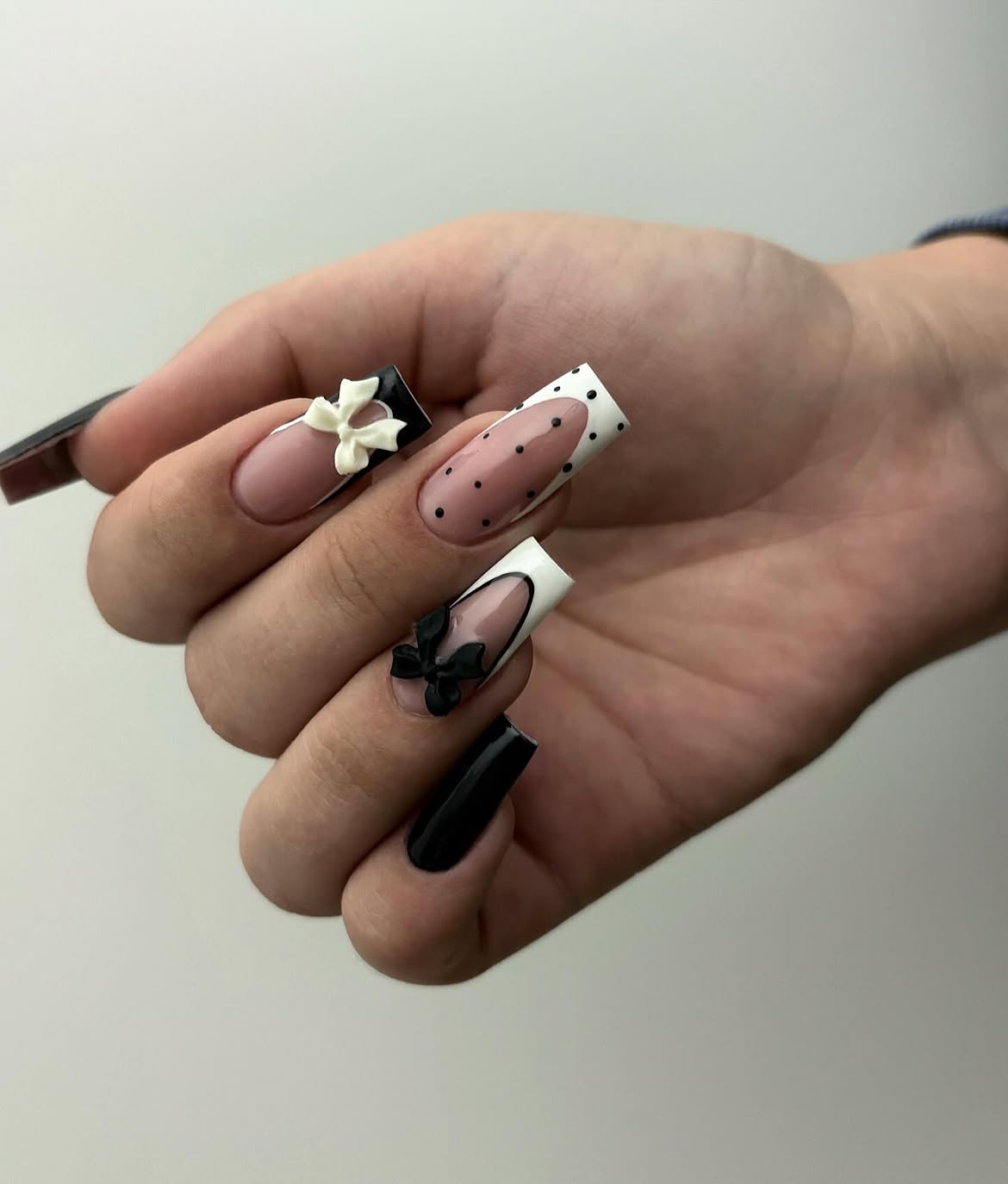 Chic Black and White Polka Dot Bow Nails