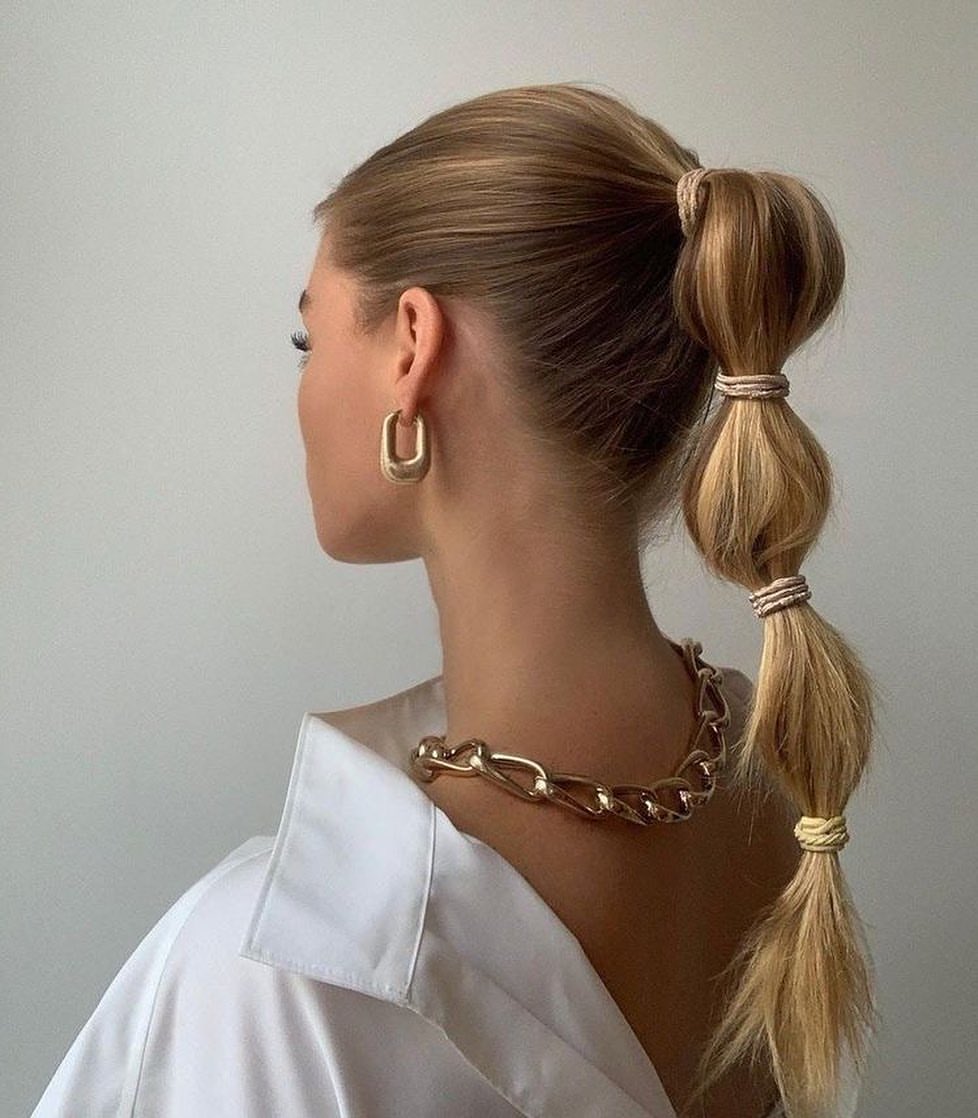 Chic Bubble Ponytail With Honey Blonde Highlights