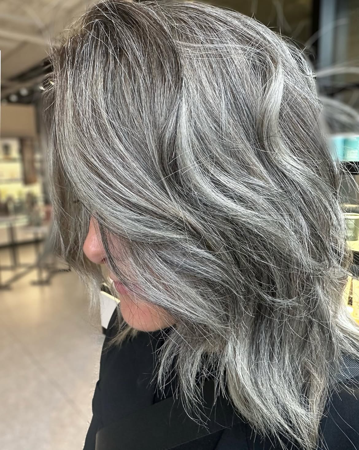 Chic Layered Lob With Blended Silver Strands
