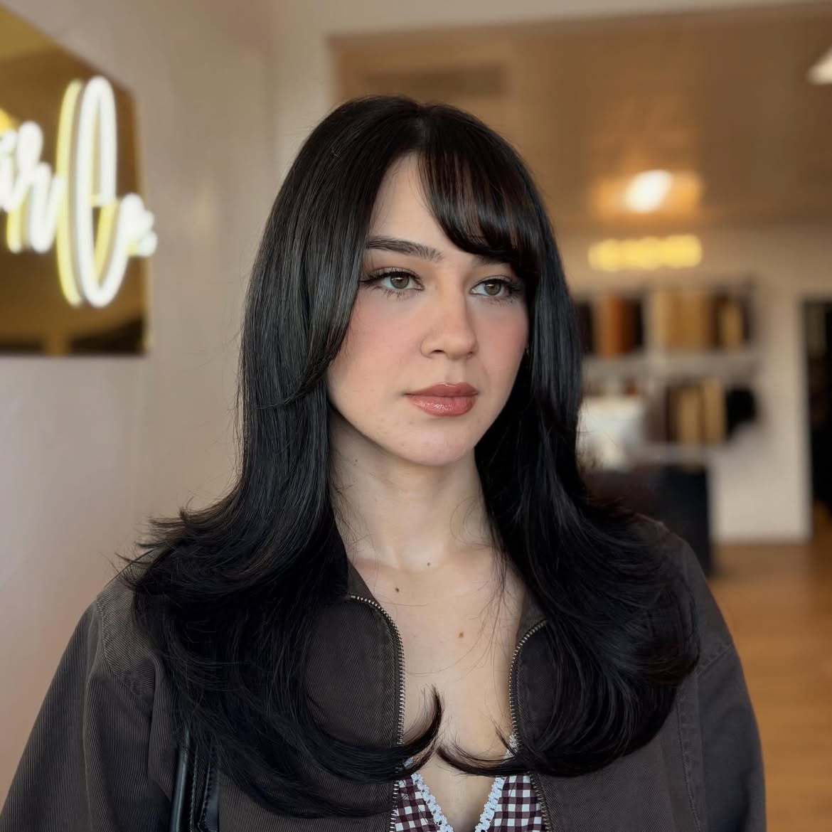 Chic Side-Swept Bangs With Voluminous Layers