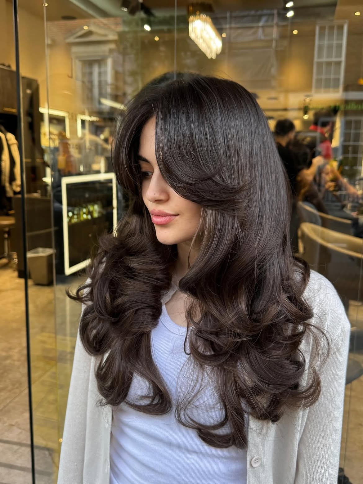 Chic Voluminous Curtain Bangs With Deep Brunette Waves