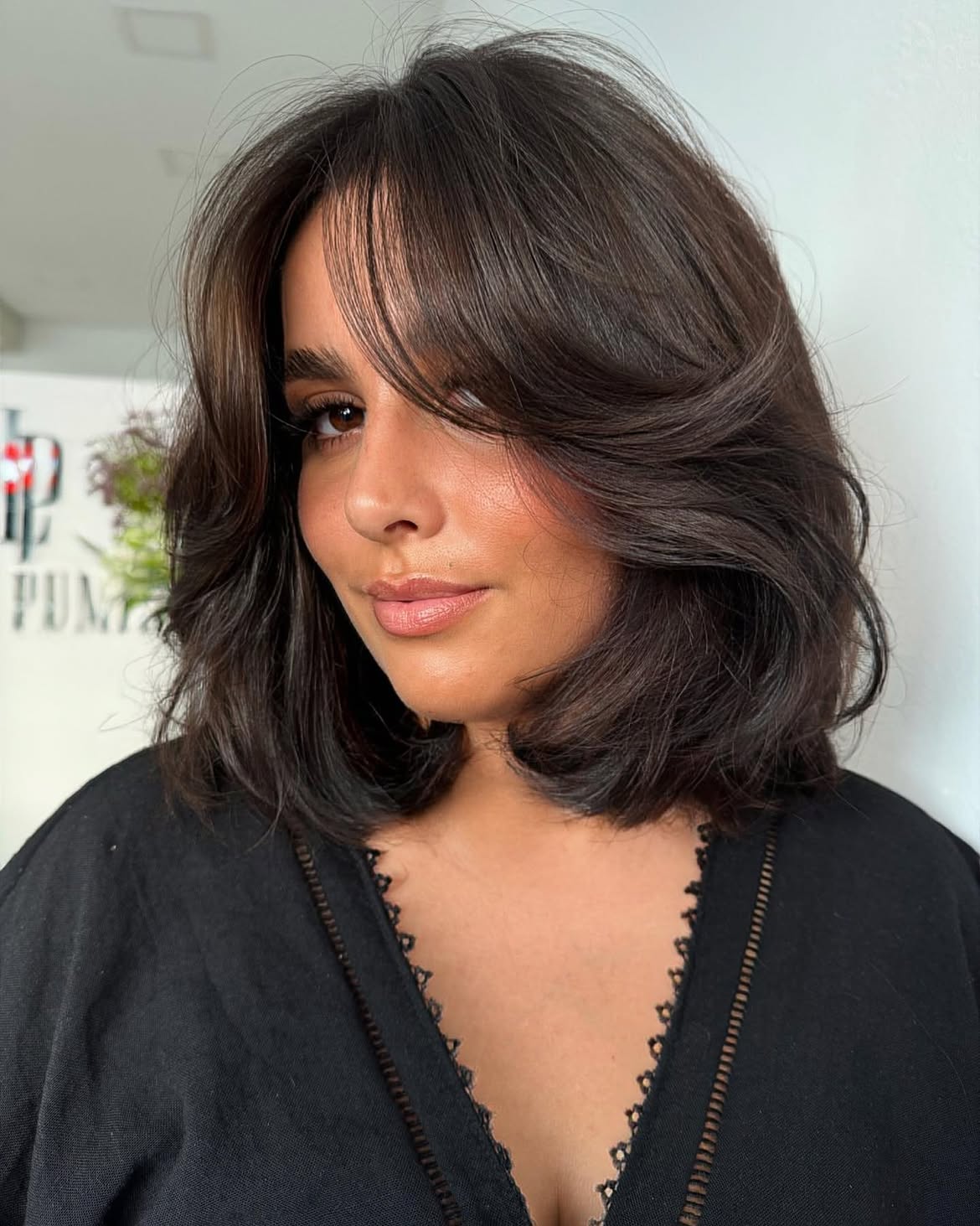 Chocolate Brown Bob With Voluminous Face-Framing Layers