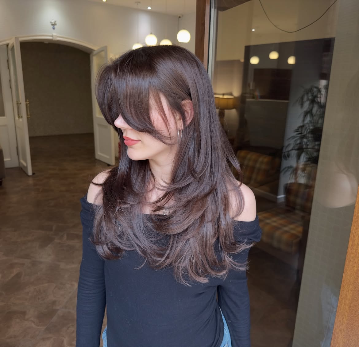 Chocolate Brown Layers With Face-Framing Bangs