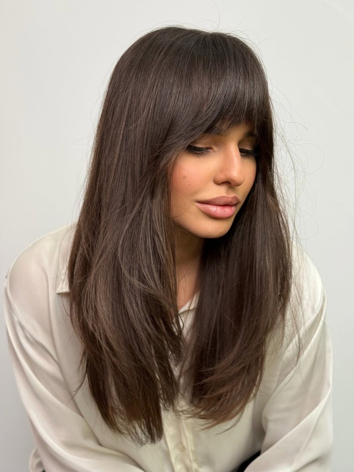 Chocolate Brown Layers With Wispy Bangs