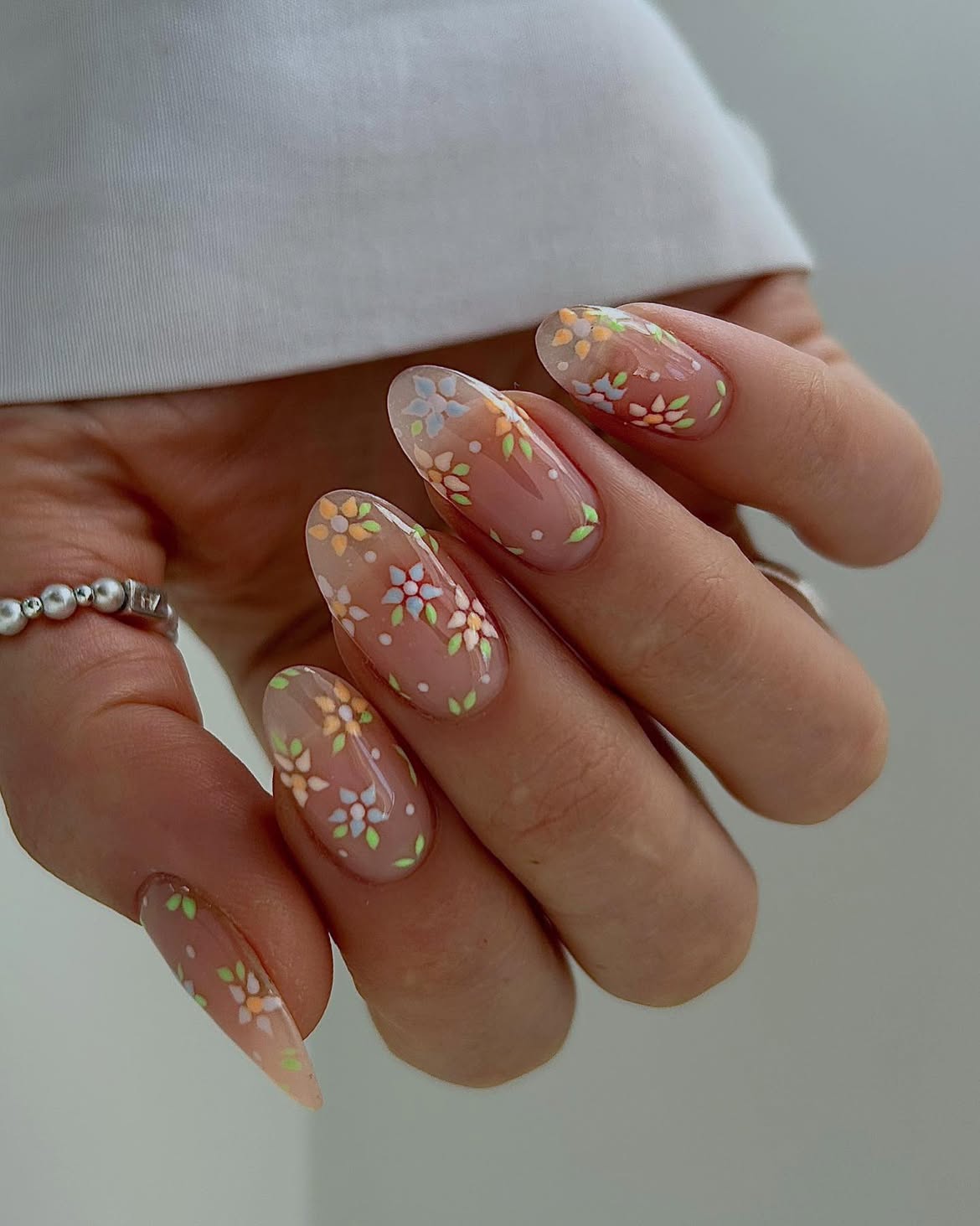 Clear Almond Nails With Pastel Hand Painted Florals