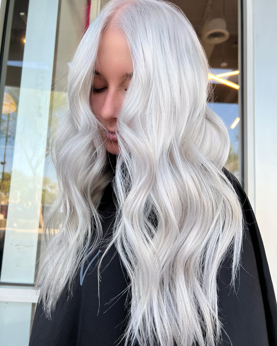 Cool Platinum Blonde Waves With Shadow Root
