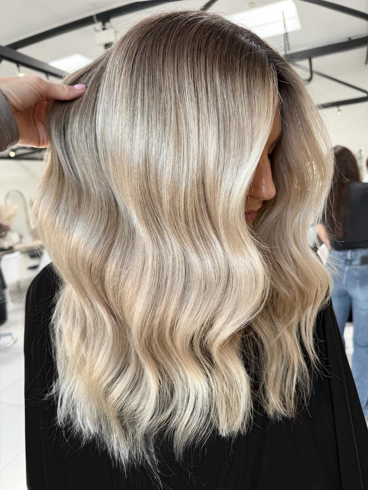 Cool Toned Shadow Root On Bright Platinum Waves