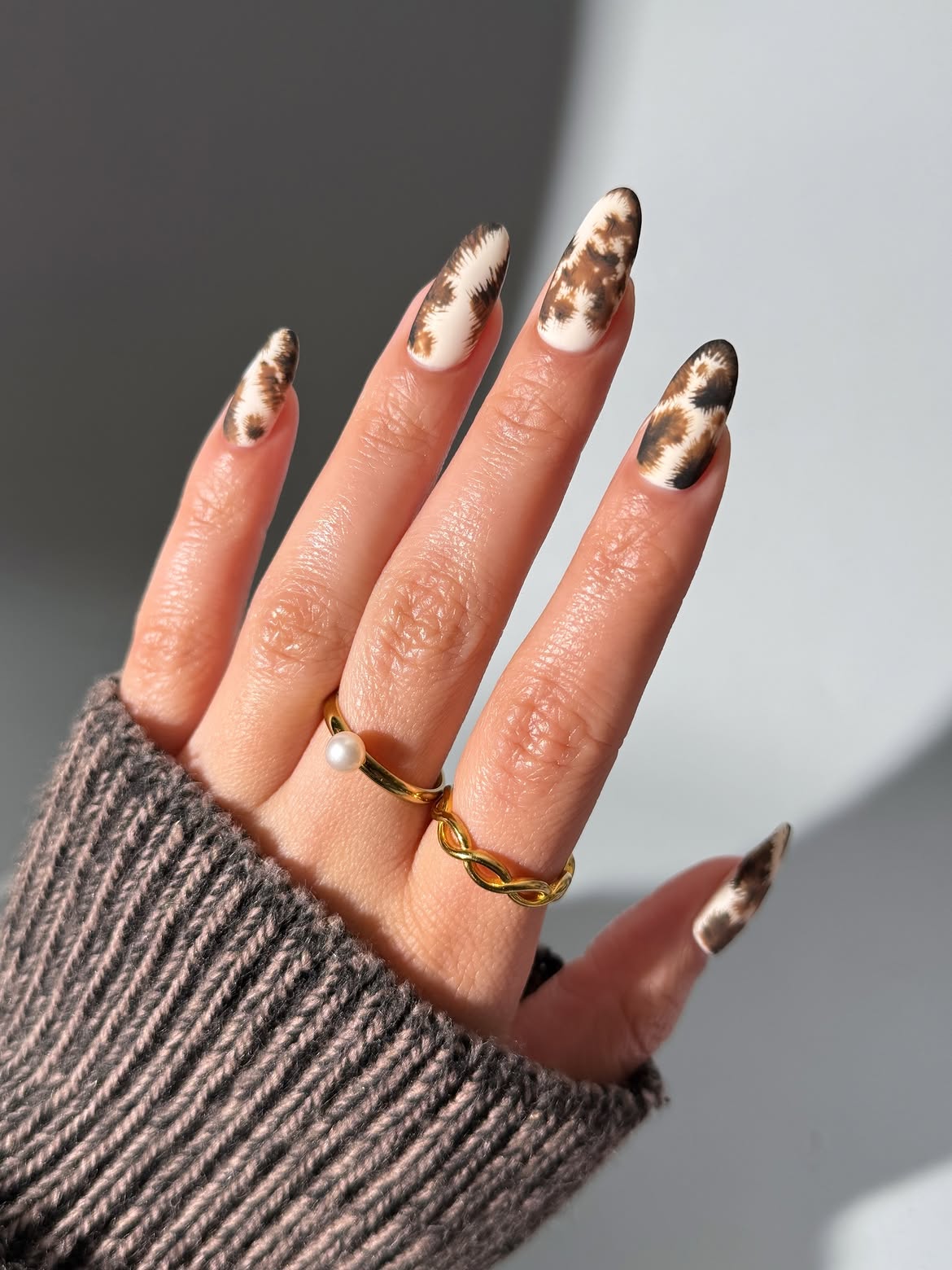 Cozy Cow Print Matte Almond Nails