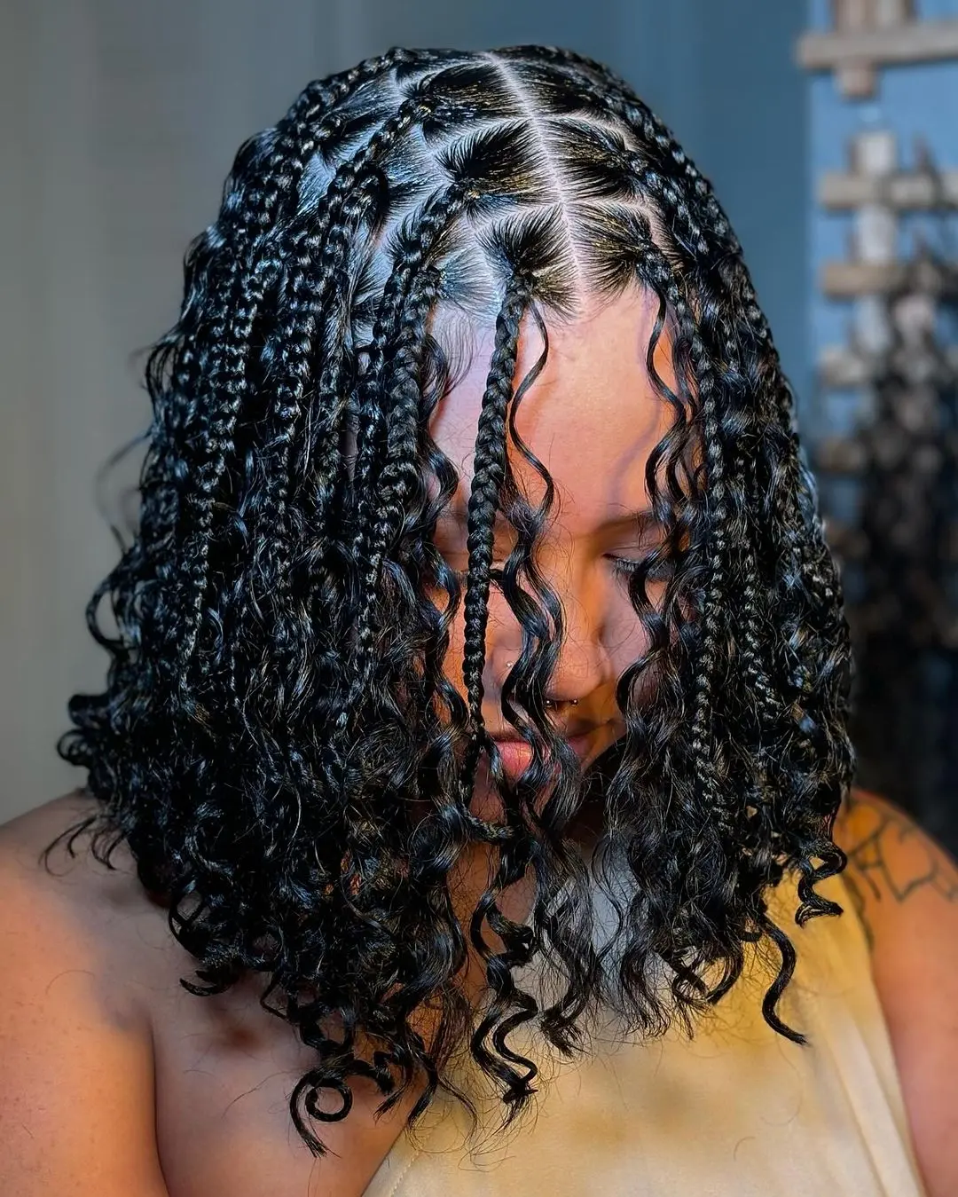 Curly Ends Bob Braids With Geometric Parting