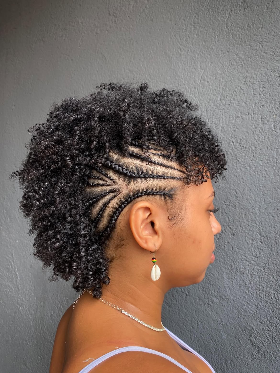 Curly Faux Hawk With Intricate Side Cornrows