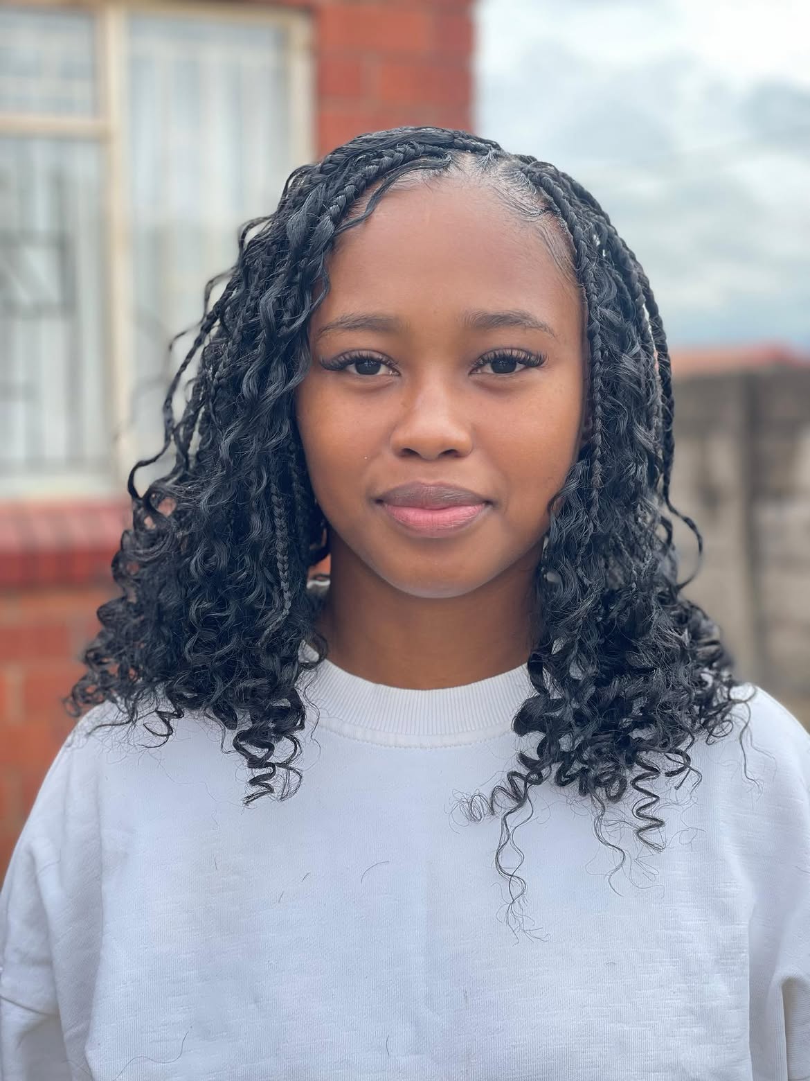 Curly Textured Bob Braids With Sleek Roots