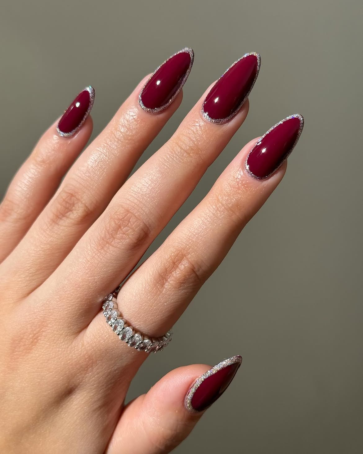 Deep Berry Stiletto Nails with Silver French Outline