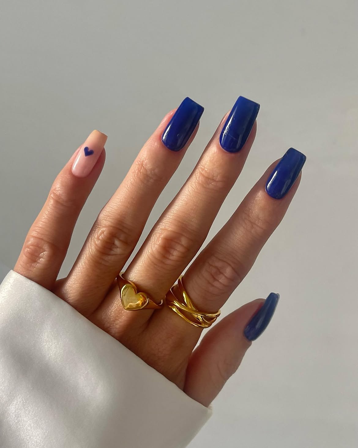 Deep Blue Glossy Square Nails with Nude Accent Heart