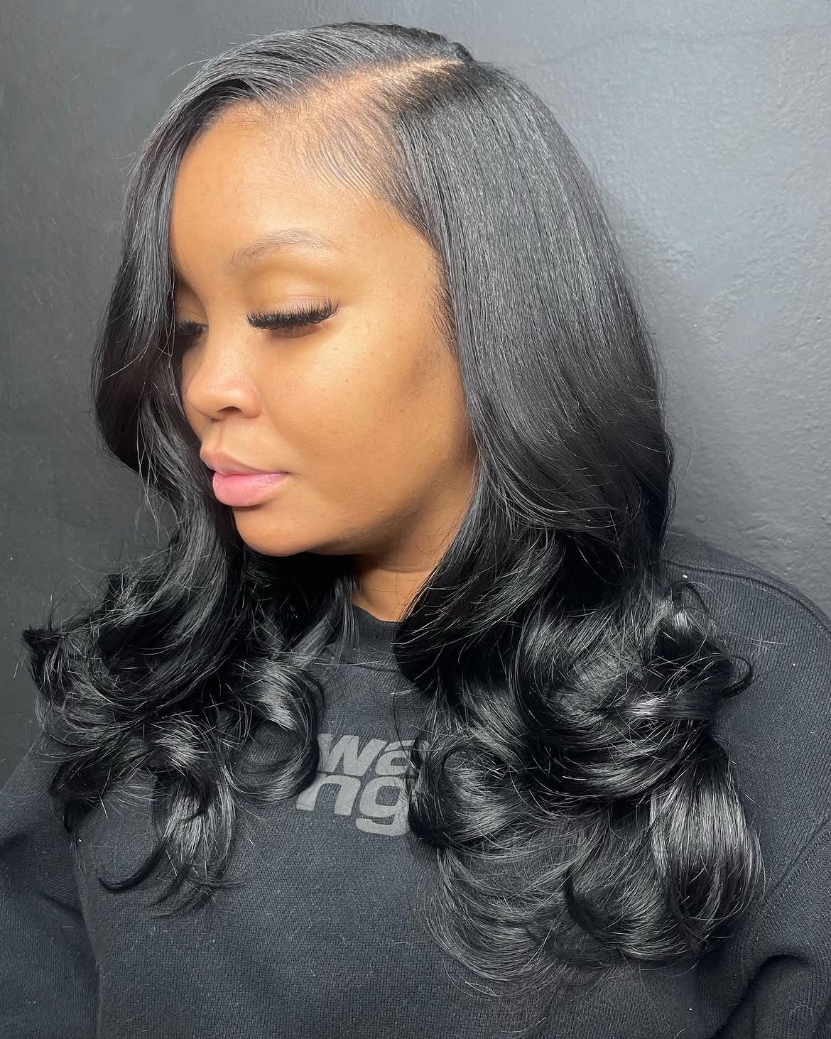 Deep Side Part Loose Curls With Face Framing Layers