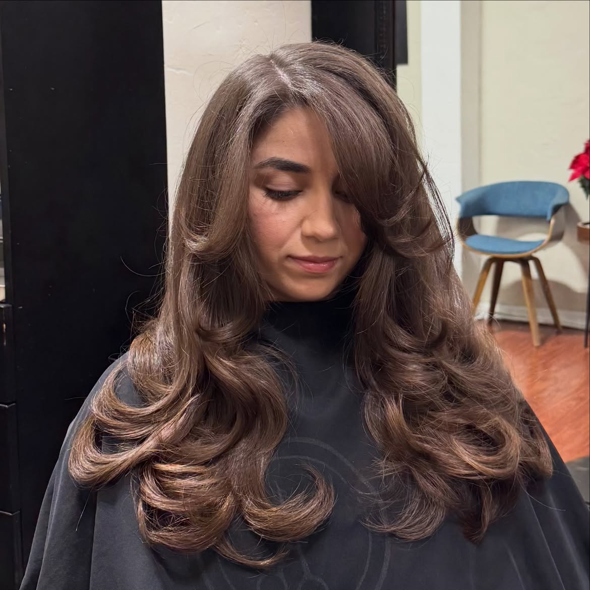 Deep Side Part Voluminous Blowout With Face Framing Layers