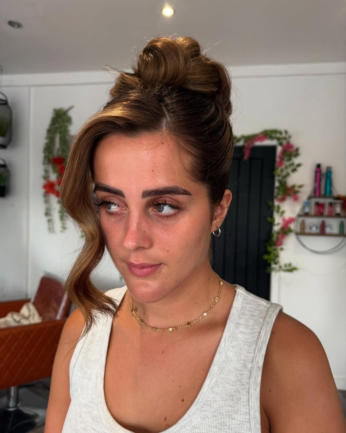 Deep Side Part Voluminous High Bun