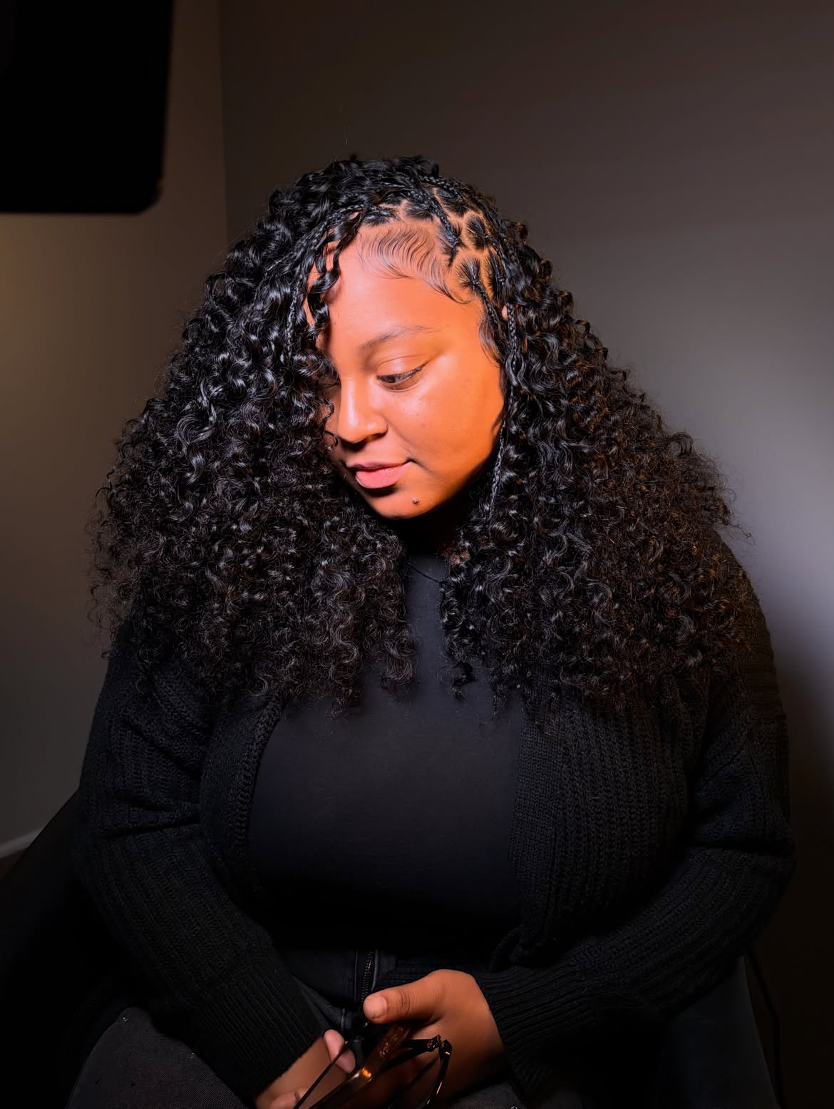 Defined Knotless Braid Crown With Voluminous Curly Texture