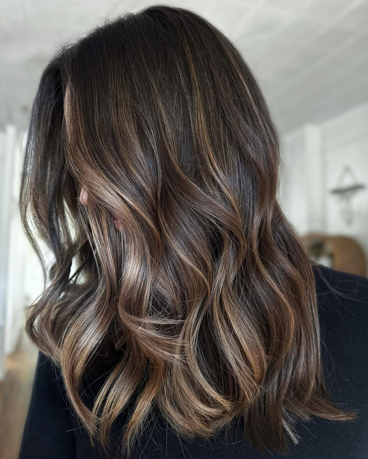 Dimensional Brunette Balayage With Soft Wavy Layers
