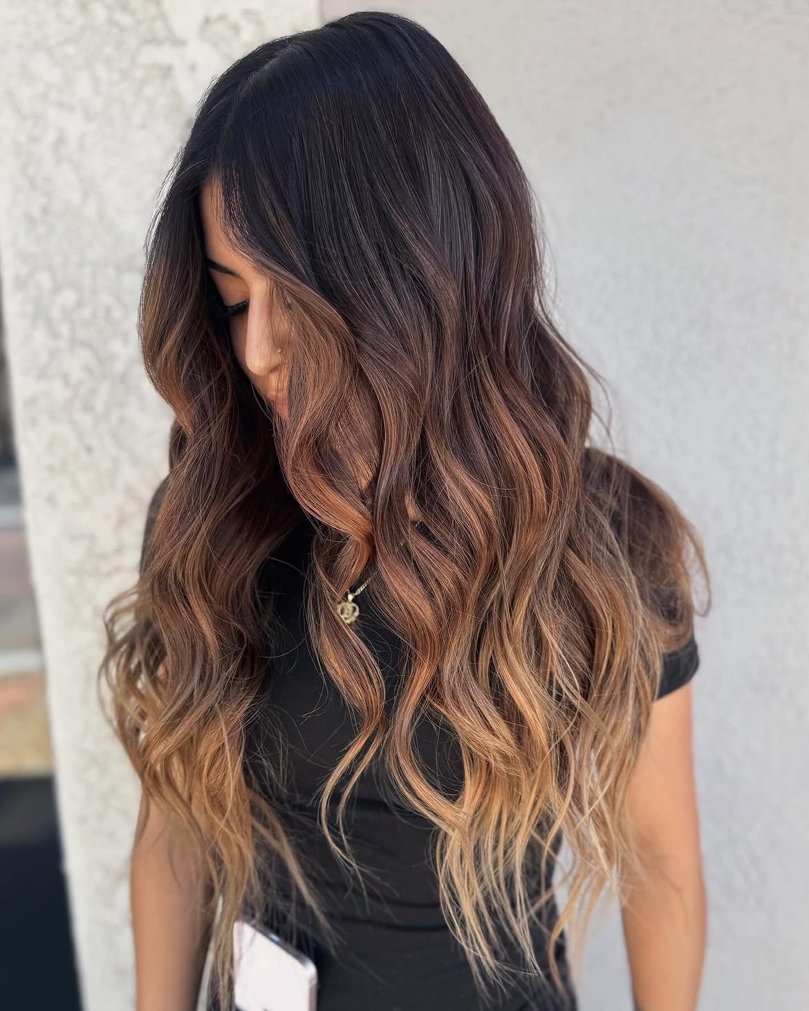 Dimensional Caramel Balayage On Dark Wavy Hair
