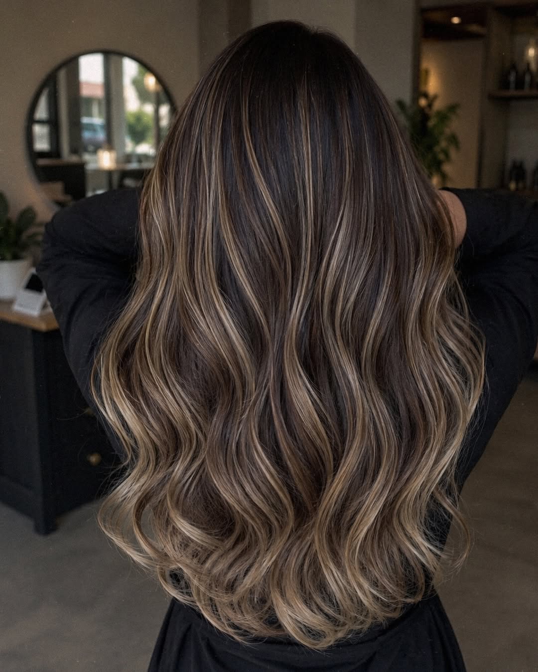 Dimensional Caramel Highlights On Long Brunette Waves
