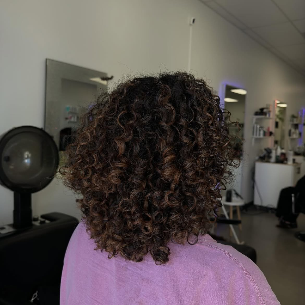 Dimensional Espresso Curls With Warm Caramel Highlights