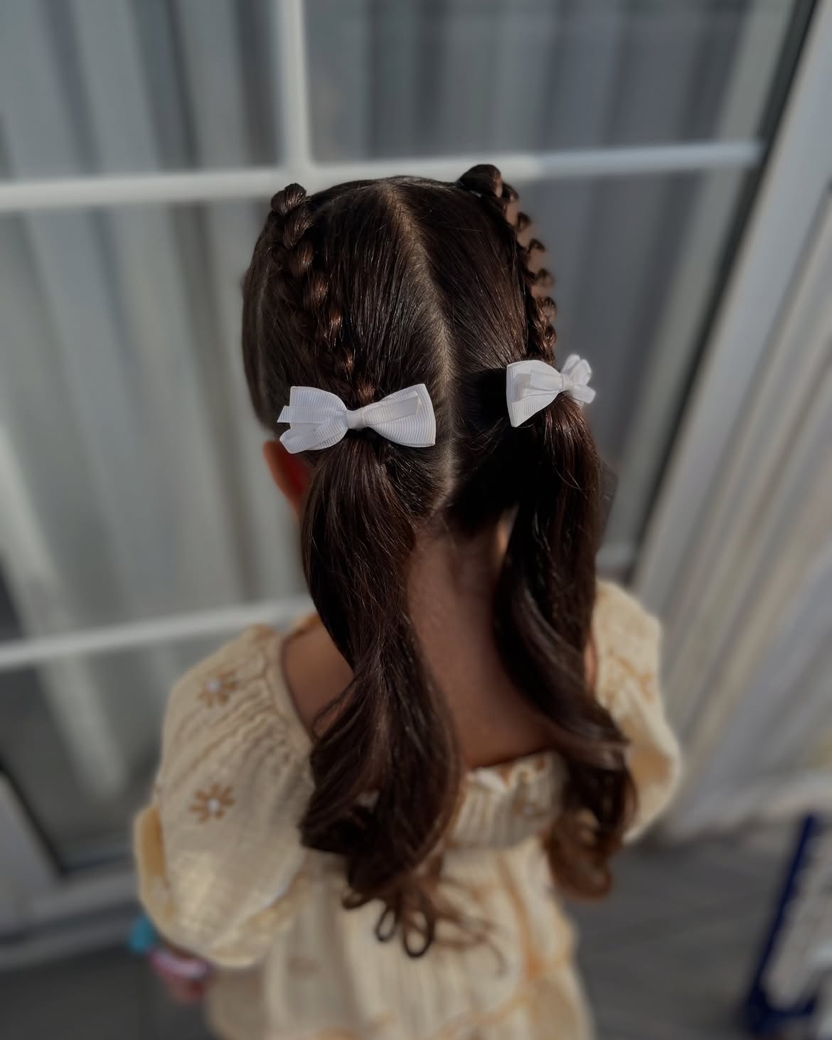 Double French Braided Pigtails With White Bows