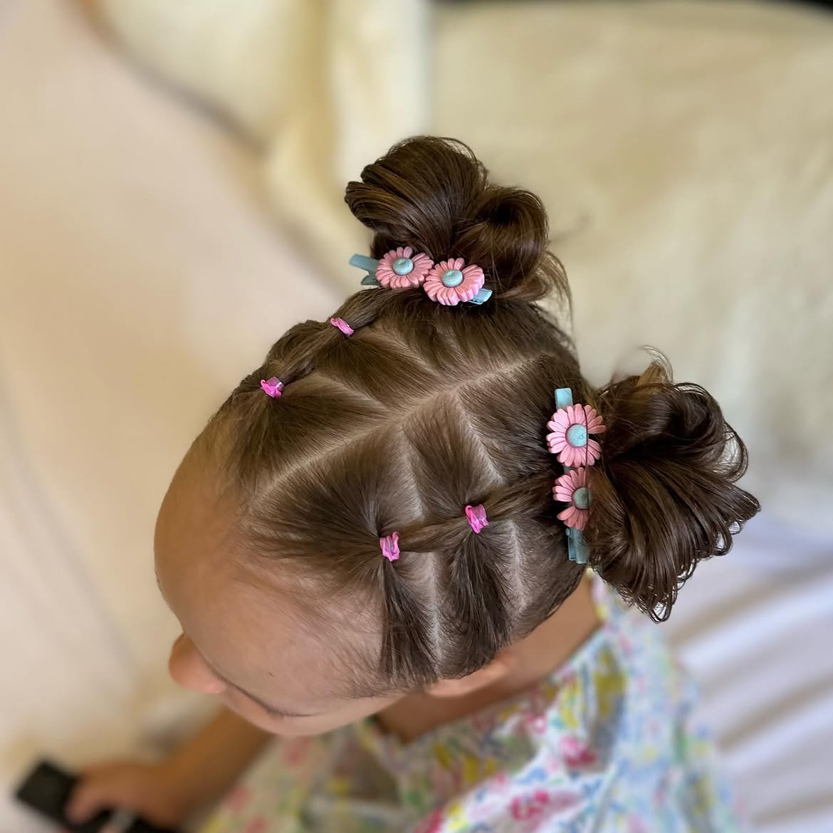Double Space Buns With Sectioned Daisy Clips