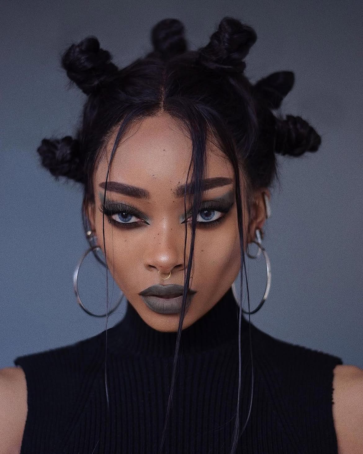 Edgy High Bantu Knots With Face-Framing Strands