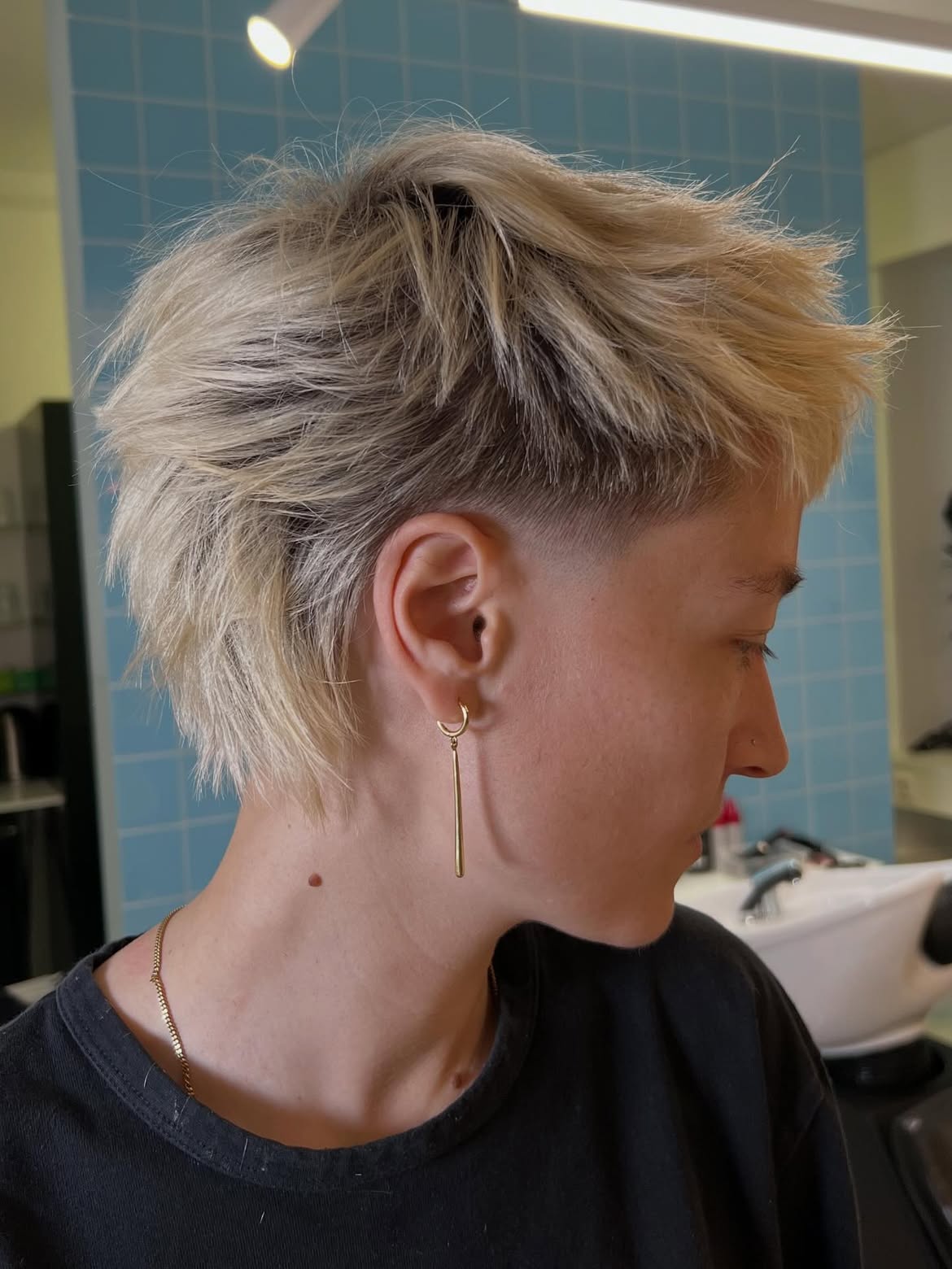 Edgy Undercut Mullet With Textured Platinum Blonde