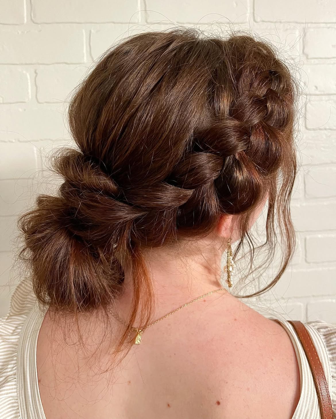 Effortless Braided Low Bun With Face-Framing Strands