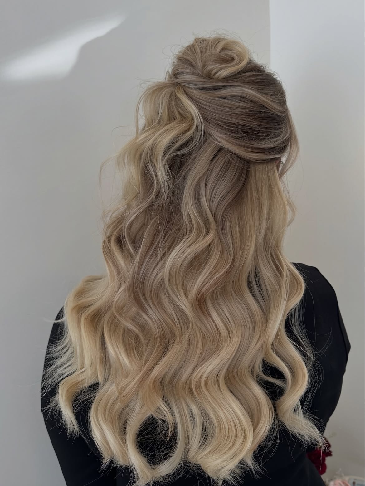 Effortless Half-Up Twist With Loose Waves