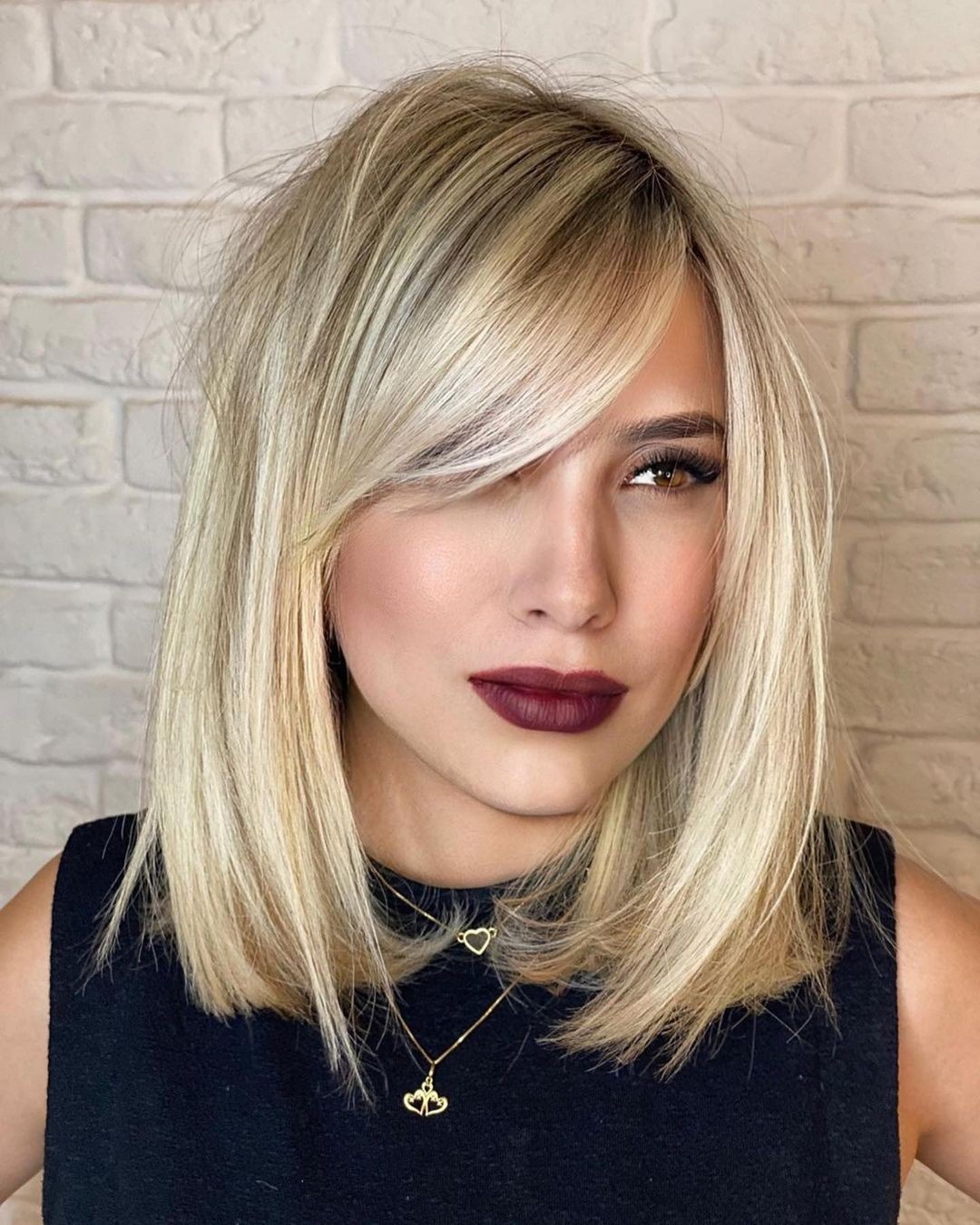 Effortless Side-Swept Bangs On Honey Blonde Bob