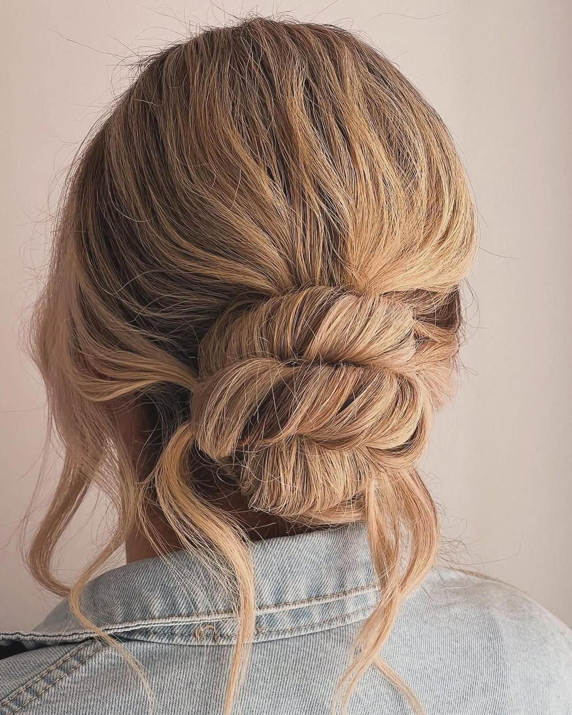 Effortless Twisted Low Bun With Face-Framing Strands