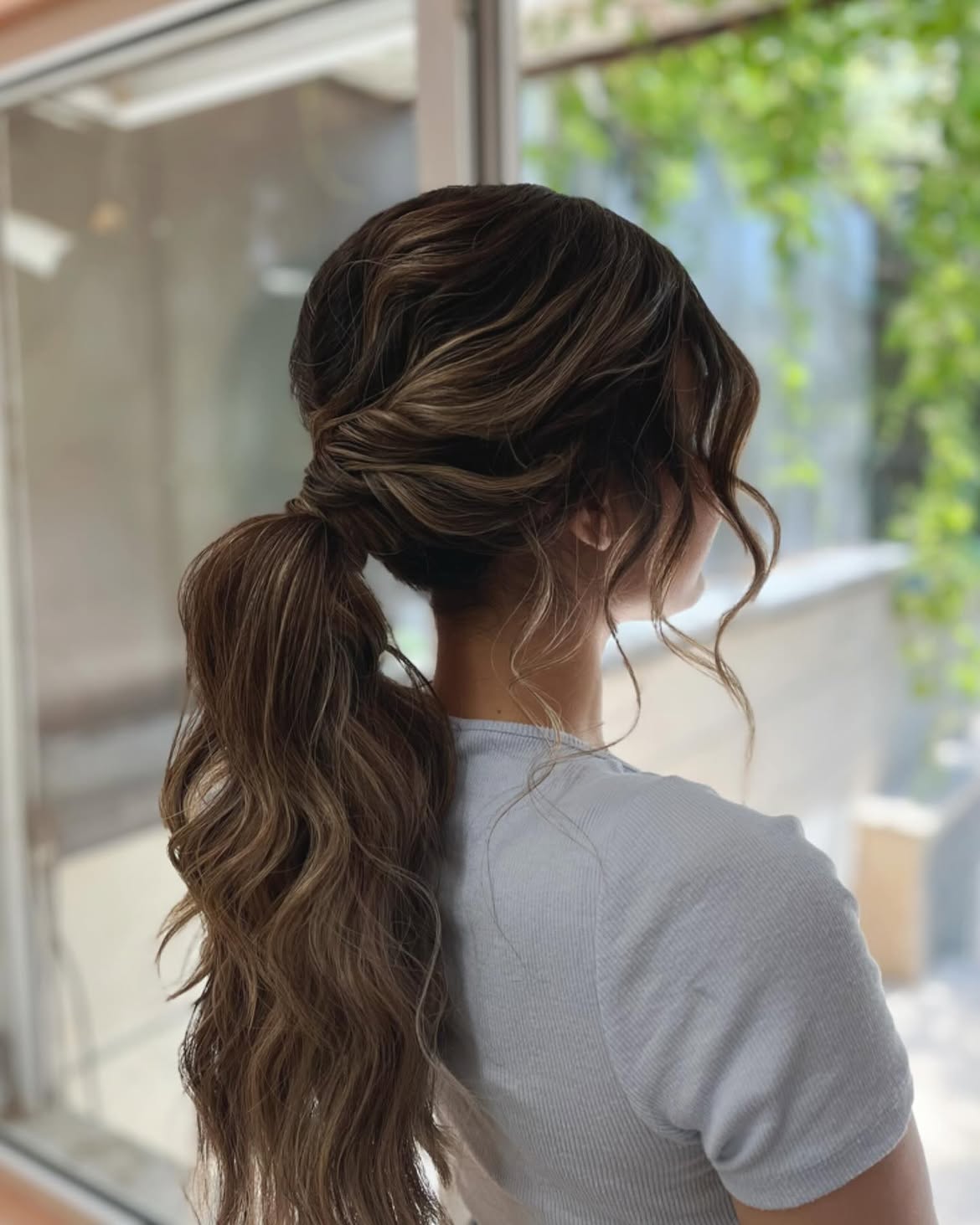 Effortless Twisted Low Ponytail With Loose Waves