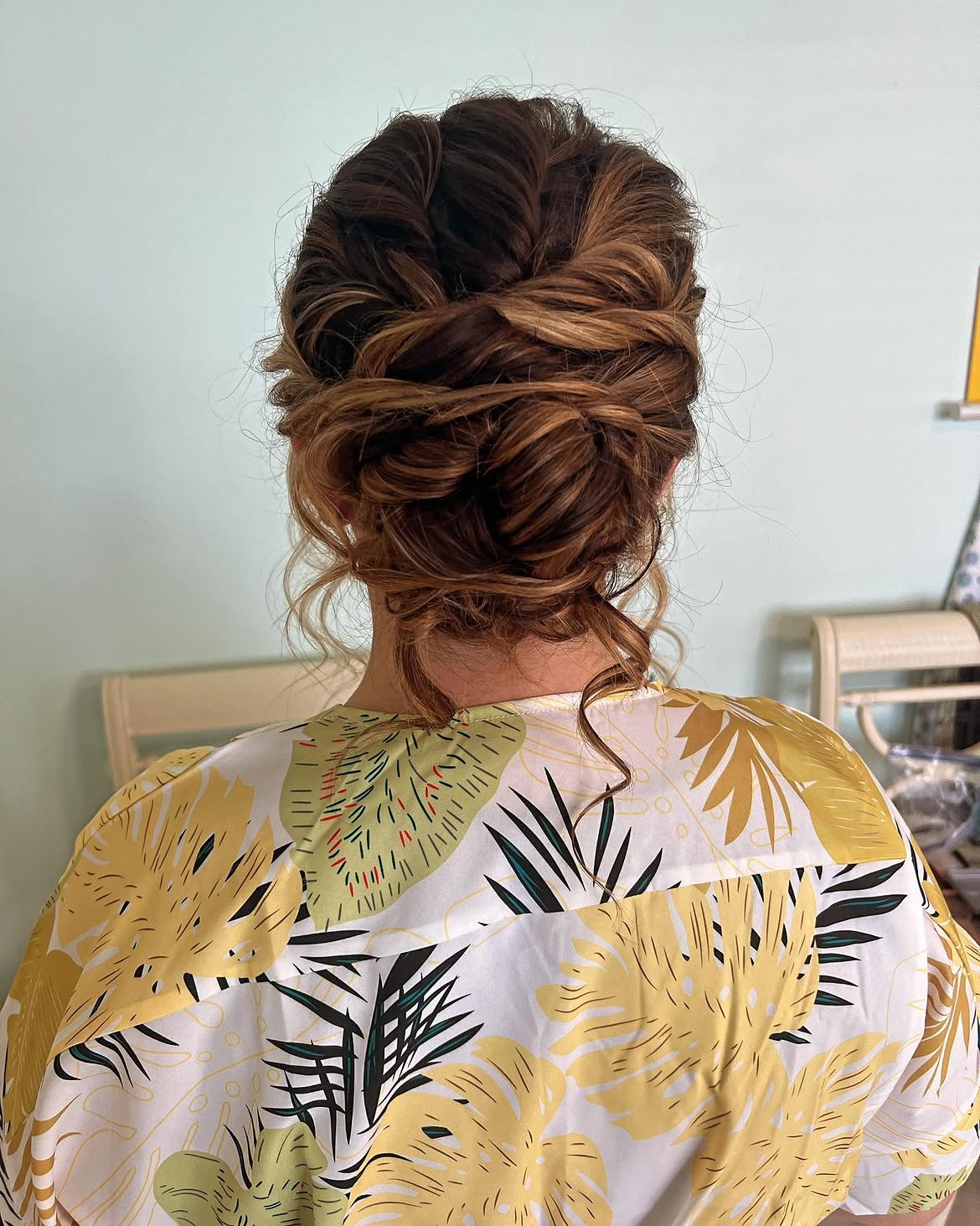 Effortless Twisted Updo With Loose Curls