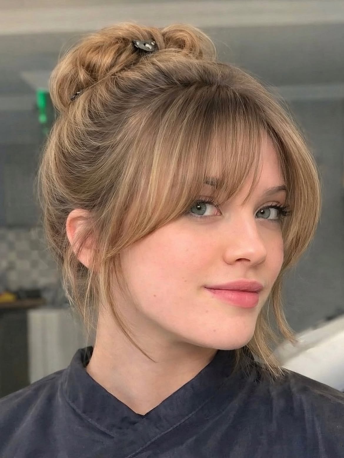 Effortless Updo With Wispy Curtain Bangs