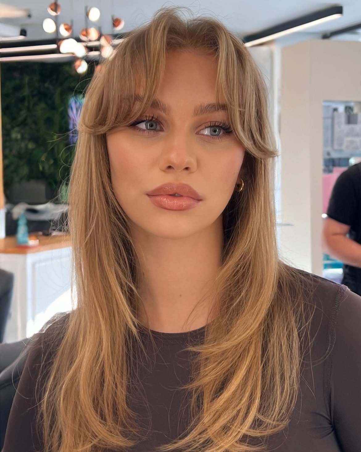 Effortless Wispy Curtain Bangs With Blonde Layers