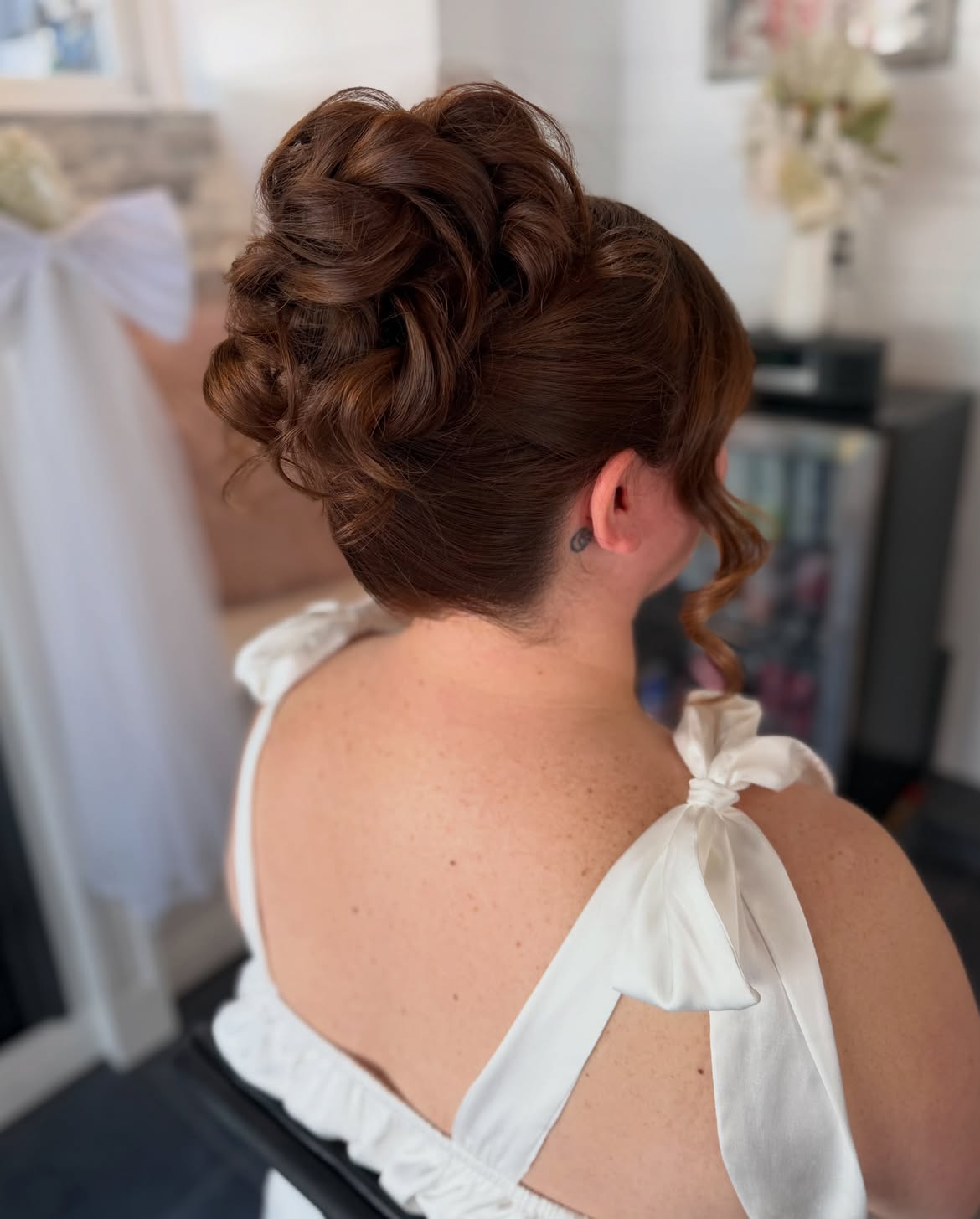 Elegant Auburn Updo With Voluminous Curls