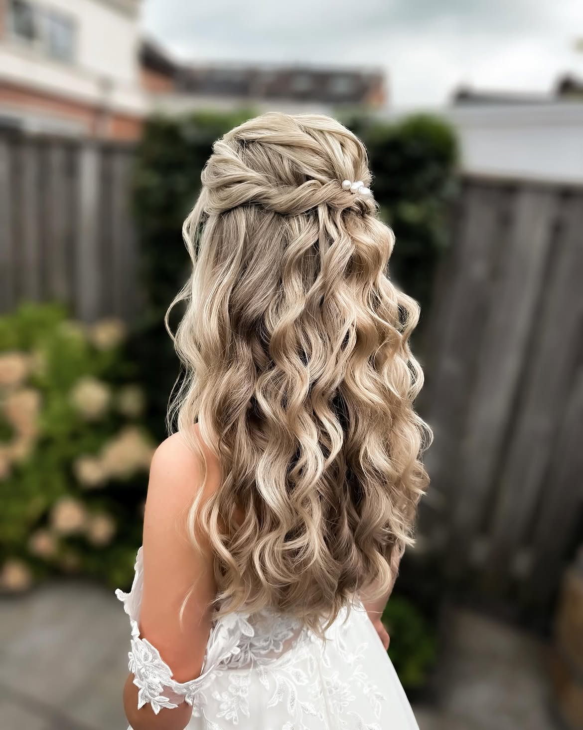 Elegant Braided Half-Up Waves With Pearl Accent