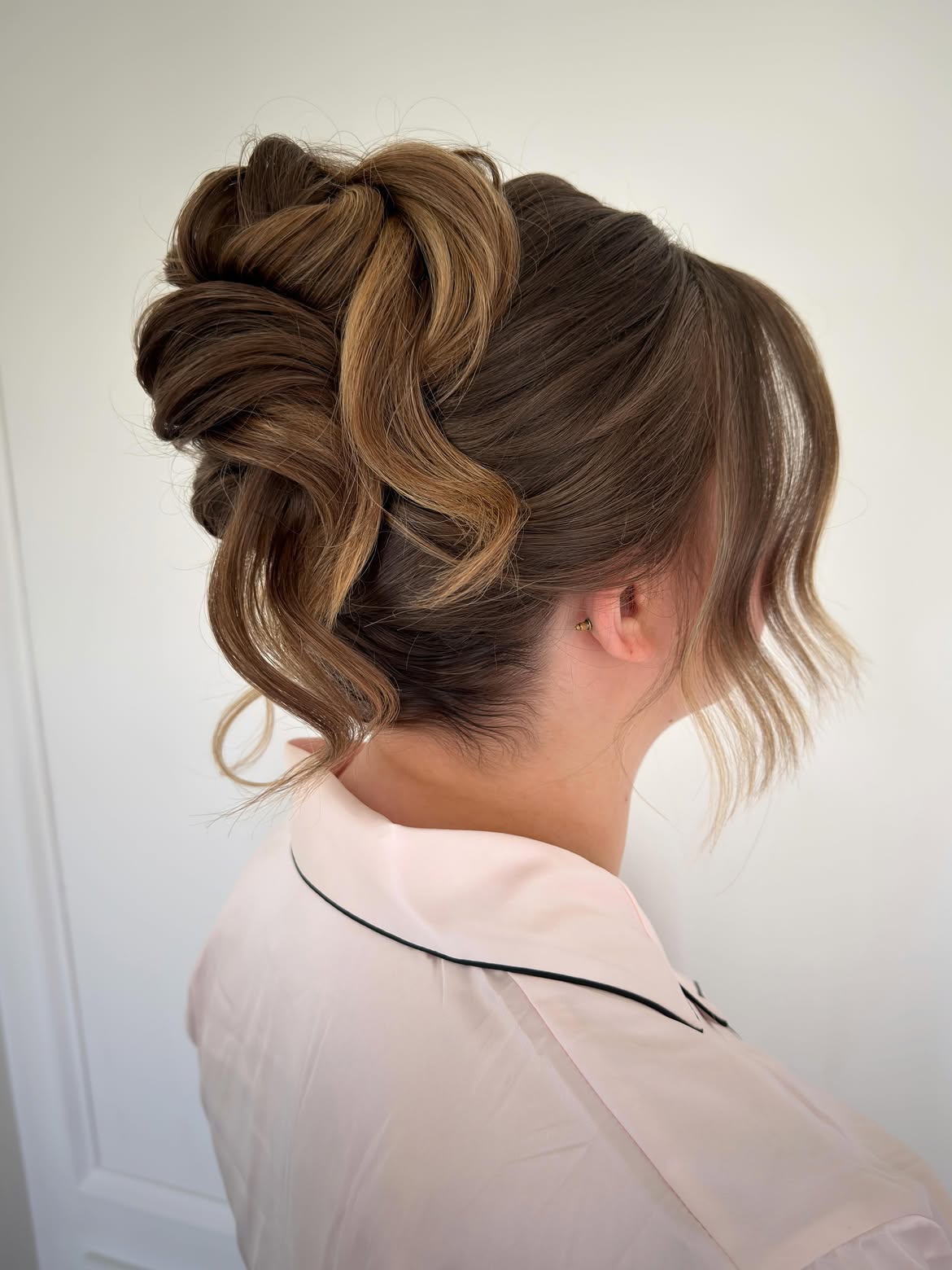Elegant Chignon With Soft Face Framing Curls