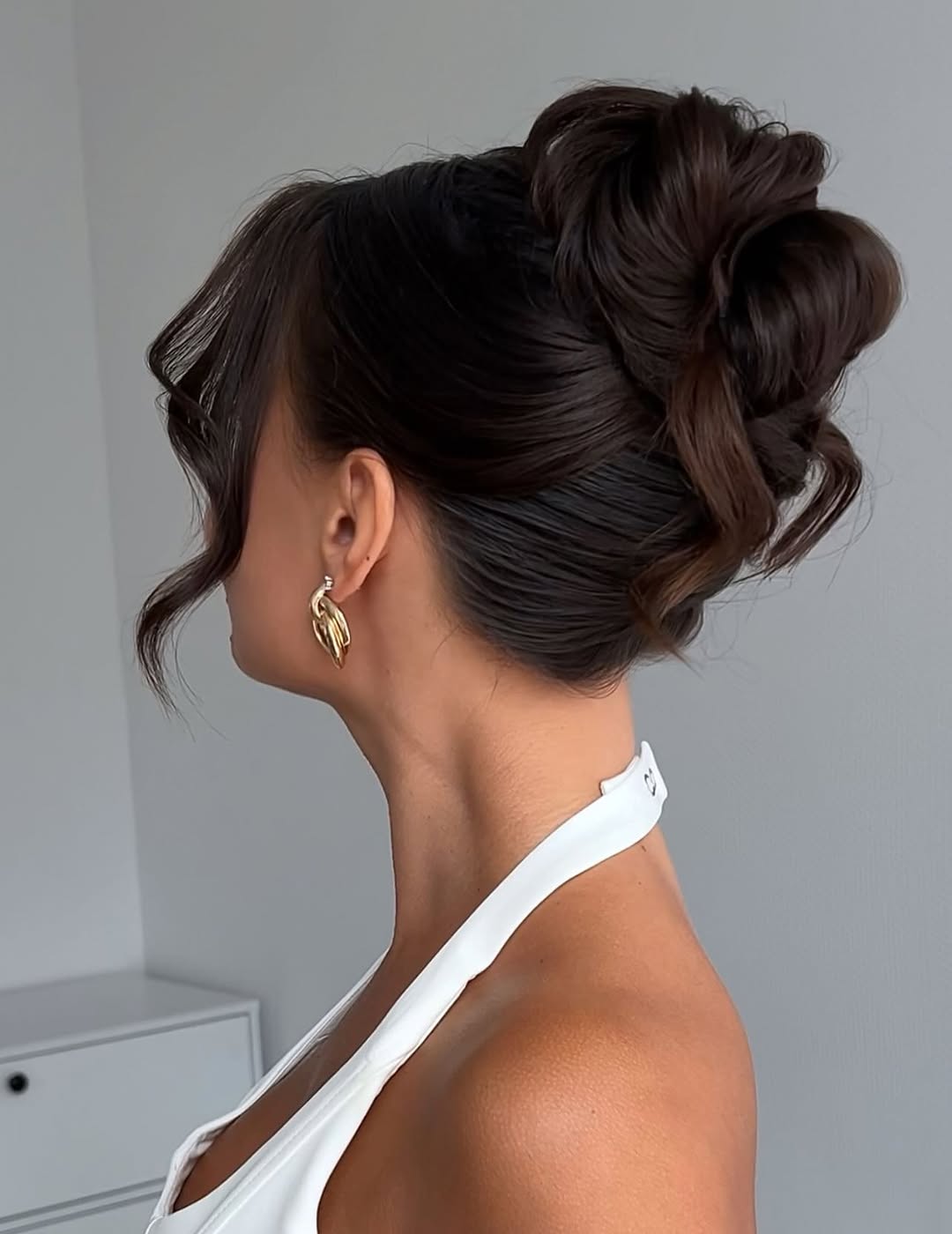Elegant Messy Updo With Face Framing Tendrils