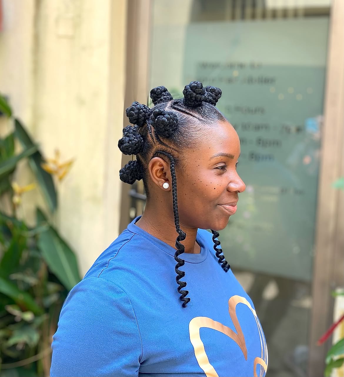 Elevated Bantu Knots With Defined Coil Tails