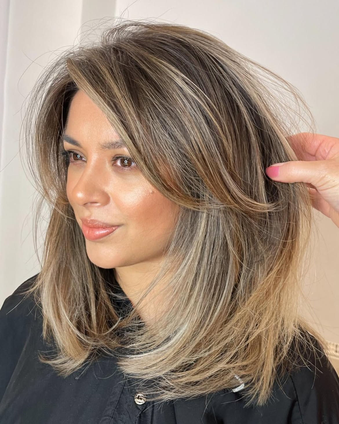 Face-Framing Side Bangs With Honey Blonde Highlights