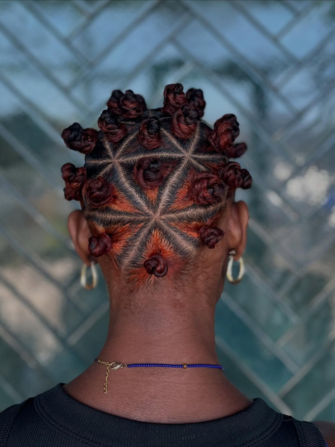 Geometric Bantu Knots With Fiery Orange Underscore