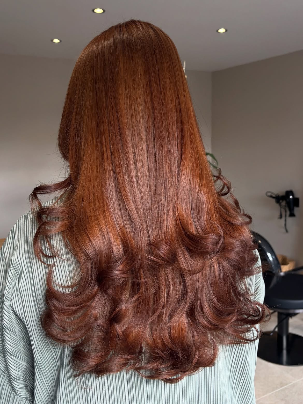 Glossy Copper Brown Layers With Soft Outward Curls