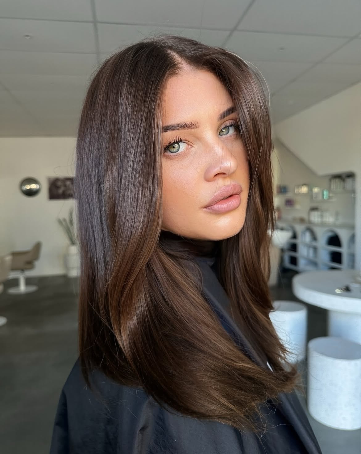 Glossy Espresso Layers With Voluminous Curtain Bangs