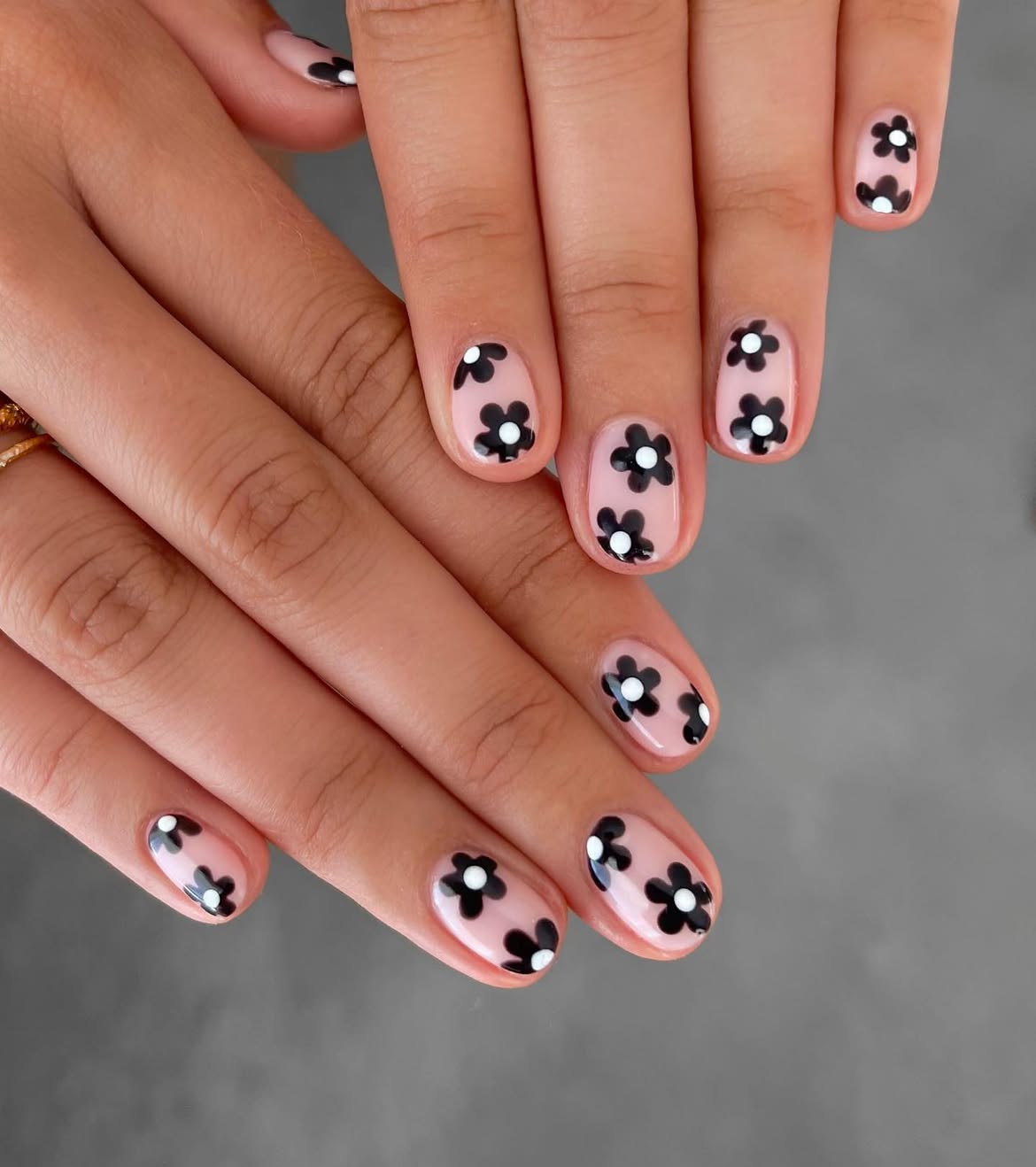 Glossy Nude Nails With Black And White Flower Art